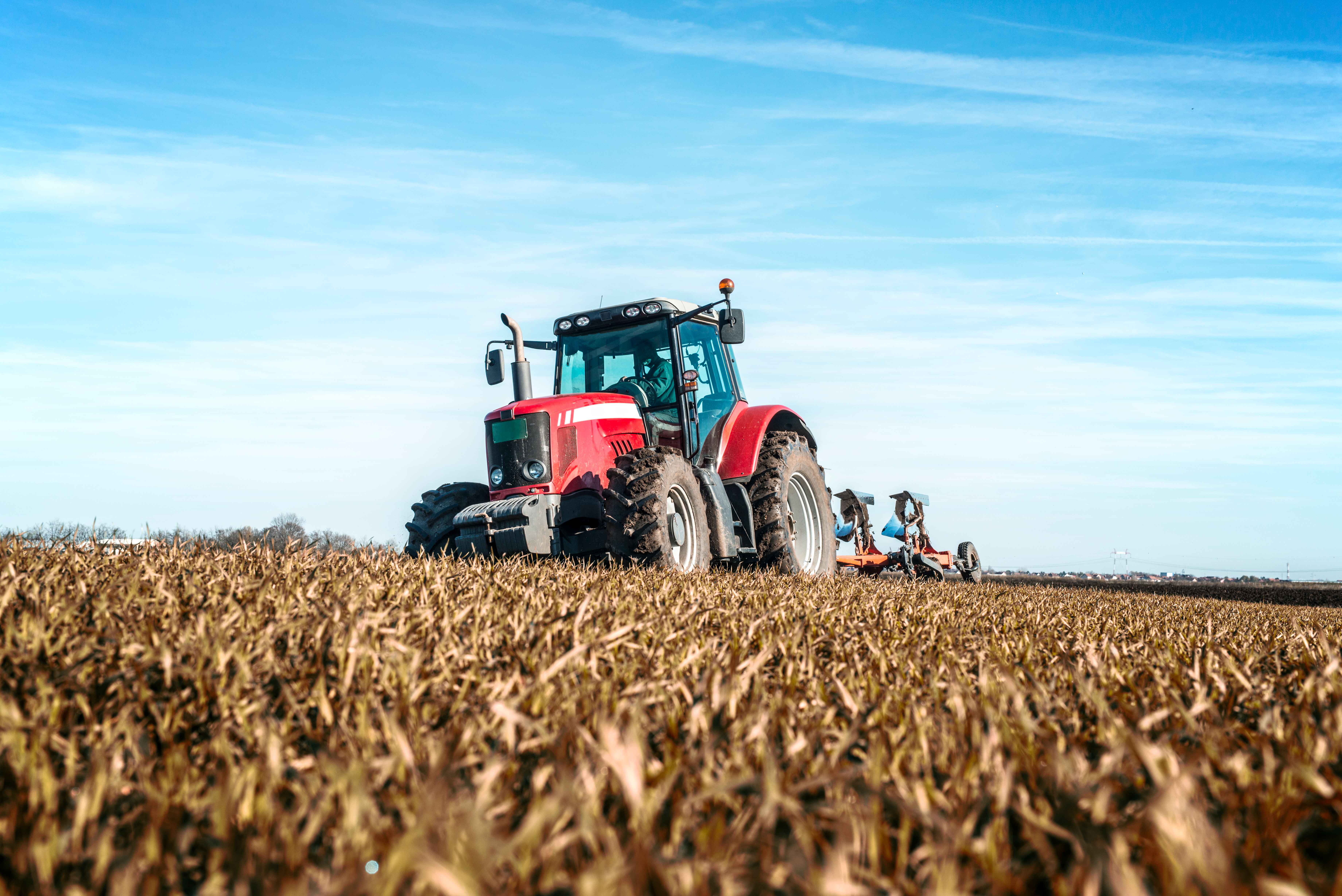tractor-agricultural-machine-cultivating-field_11zon.jpg