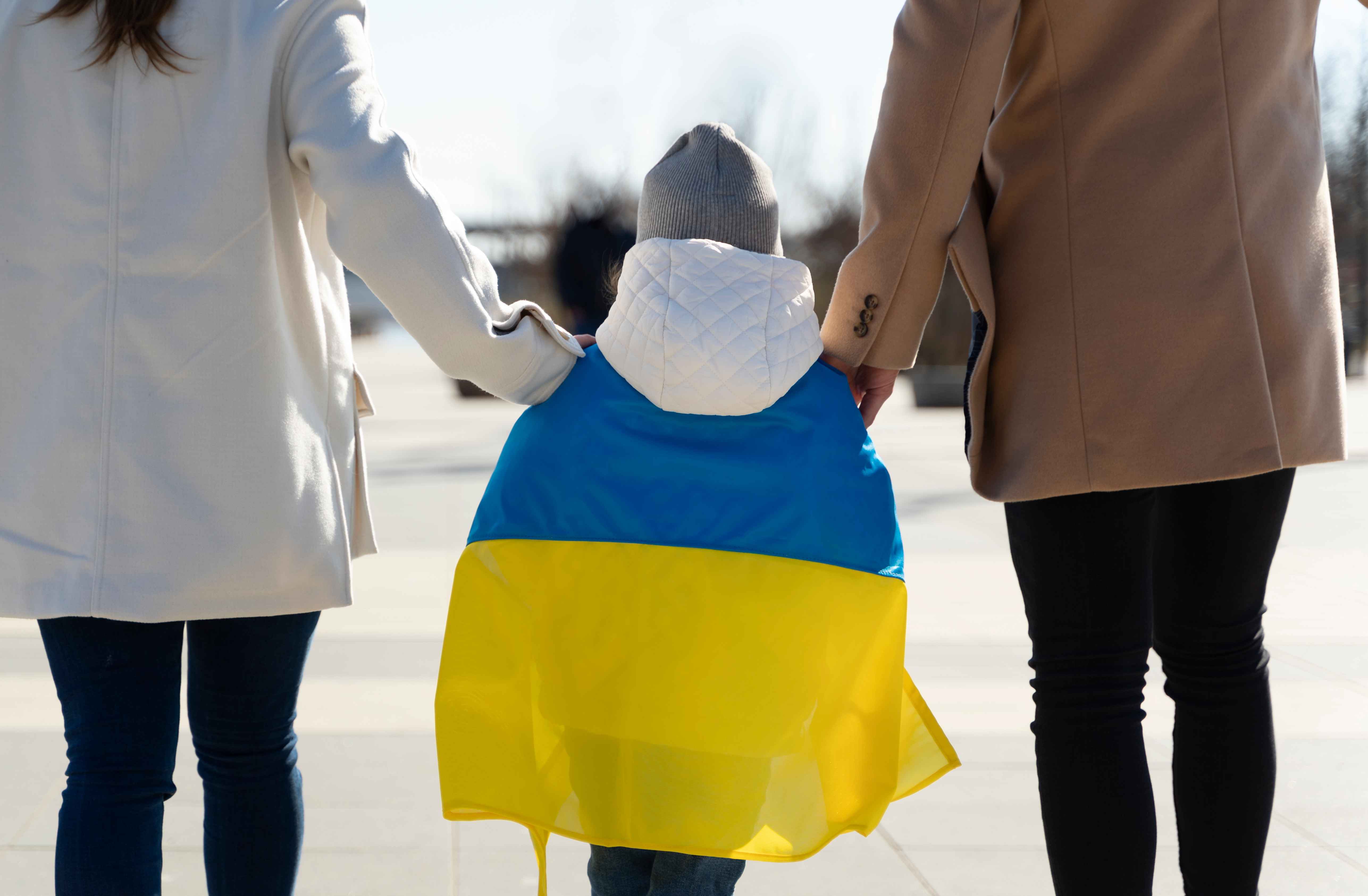 back-view-kid-wearing-ukrainian-flag_11zon.jpg
